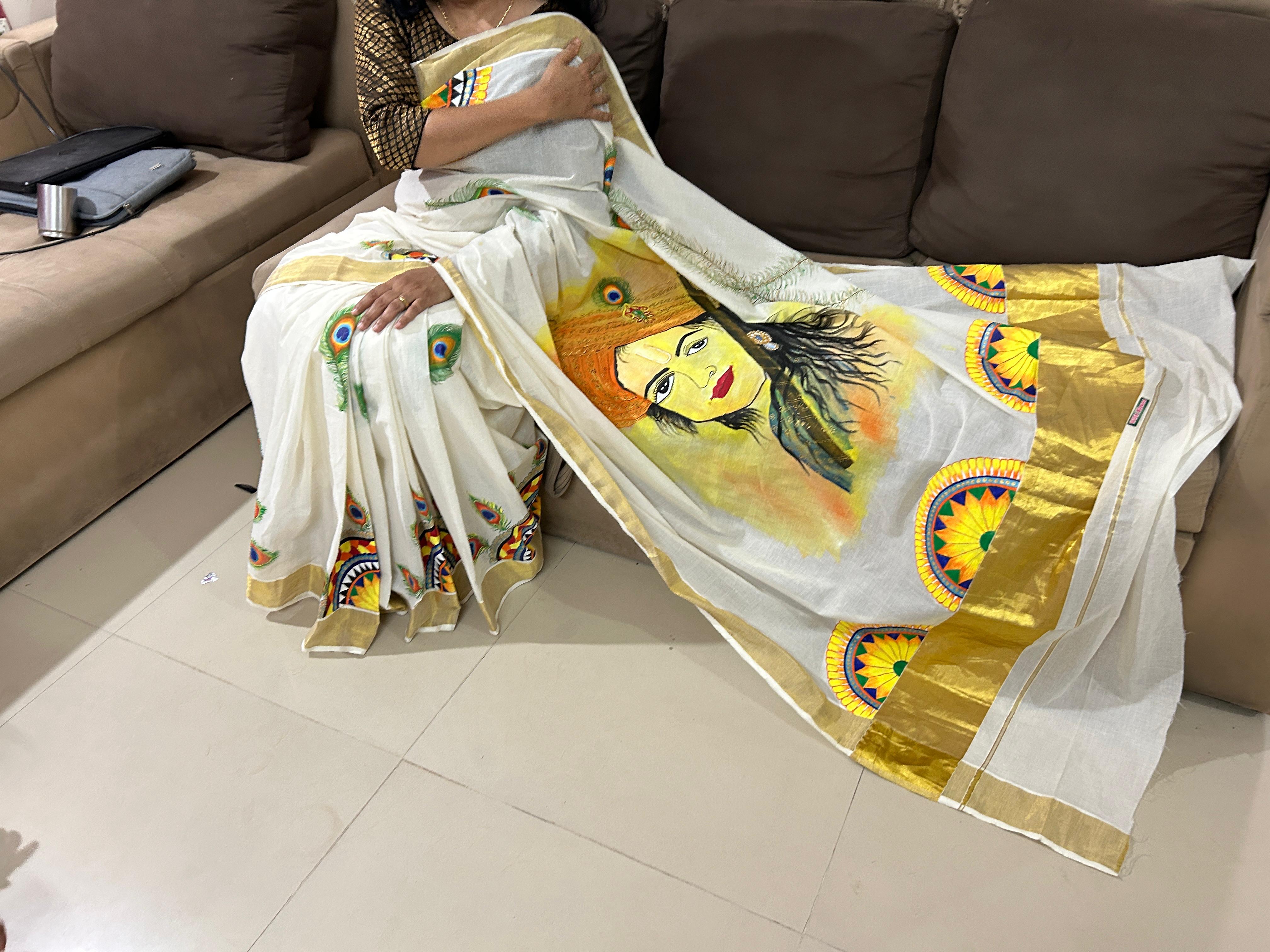 Hand-Painted Kerala Set Saree – Krishna-Inspired Art. — medium: fabric colours on cotton/kerala set saree technique: hand-painted fabric art style: traditional indian / krishna-inspired artwork: original handmade creation by Sindhu Suresh
